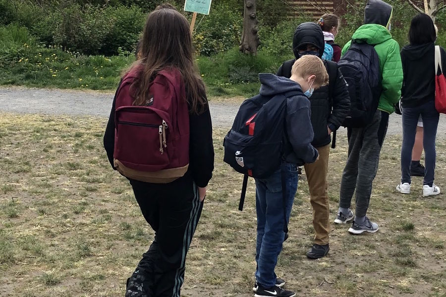 kids waiting in line to go into middle school