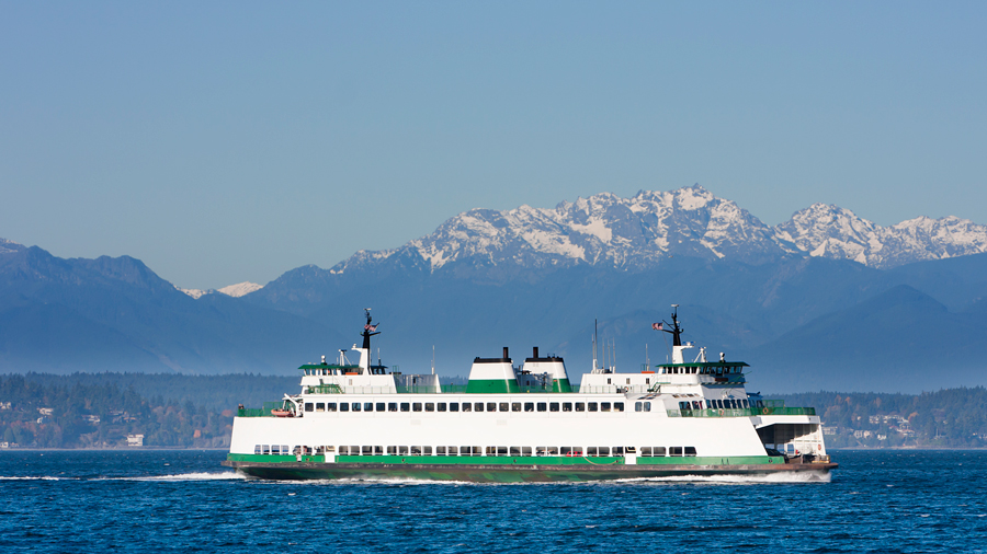The ferry crossing Puget Sound to Bainbridge Island, with mountains in the backgruond