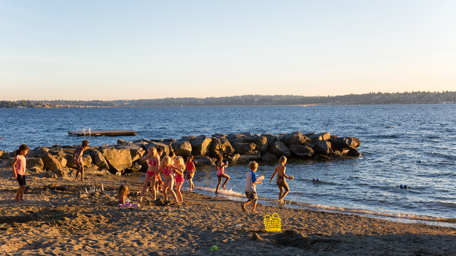 kids playing in the water of a hidden-gem beach in Medina