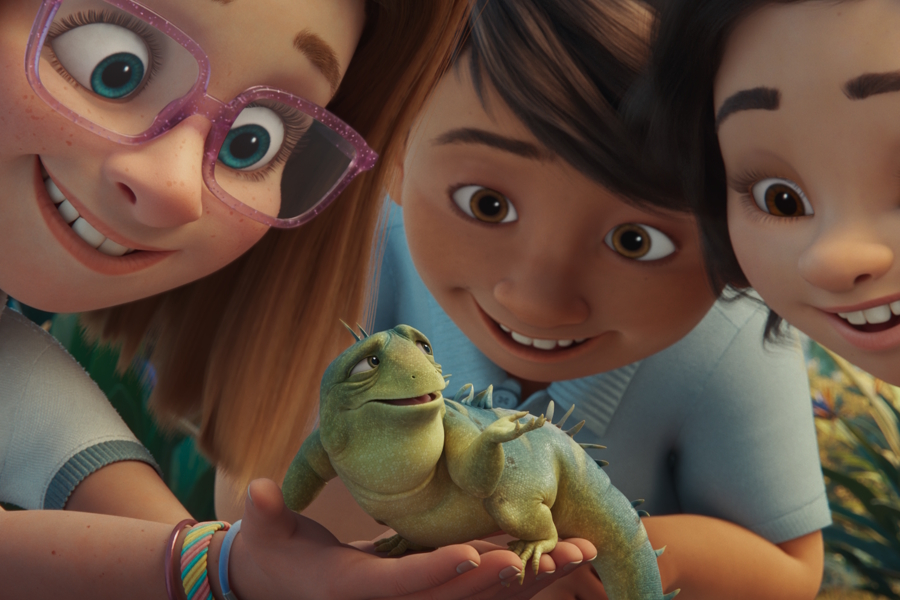 Three girls looking at Leo the lizard in the animated movie "Leo."