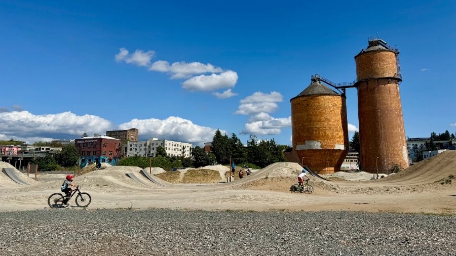 Kids ride on the pump track at Bellingham's Waypoint Park outside of Seattle