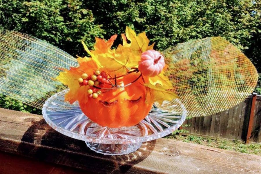 Pumpkin decorated to look like a fall fairy