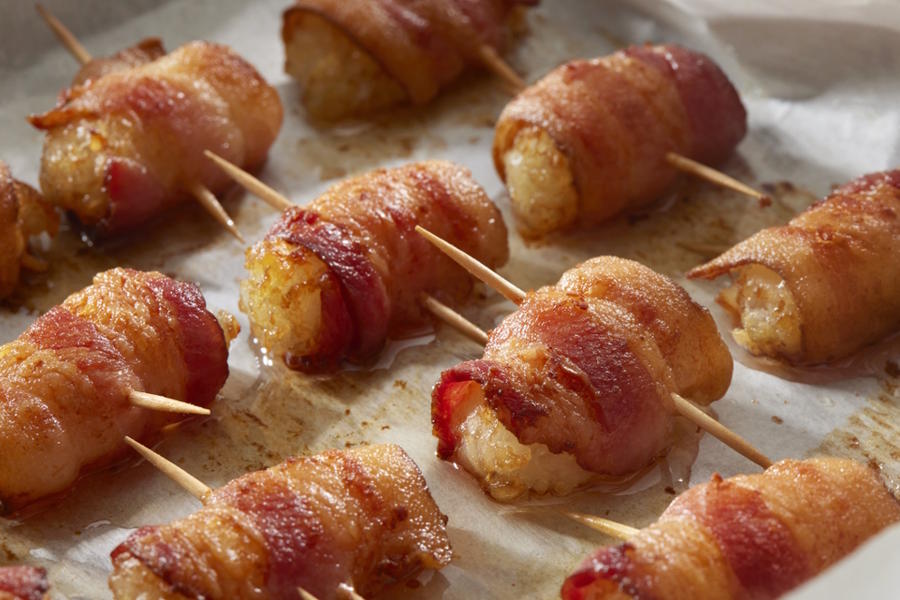 Tater tots wrapped in bacon, a Thanksgiving starter kids will love