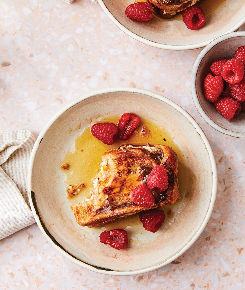 French toast with syrup and strawberries