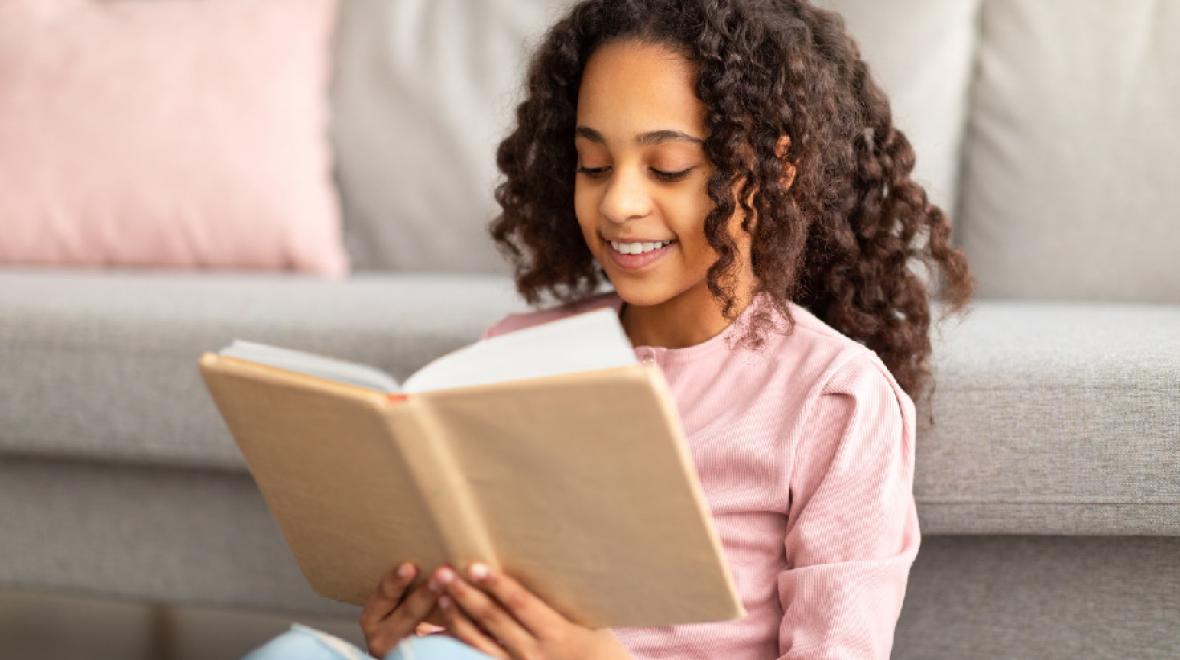 Girl-reading-at-home