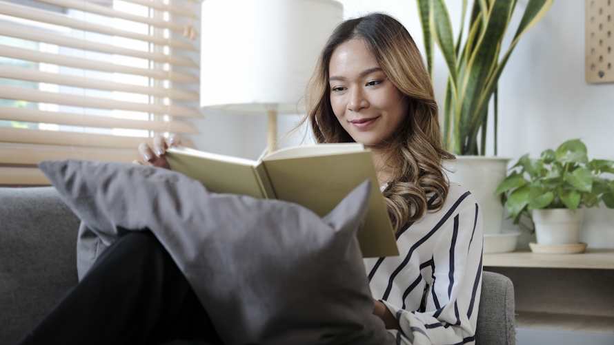 Adult woman reading a book