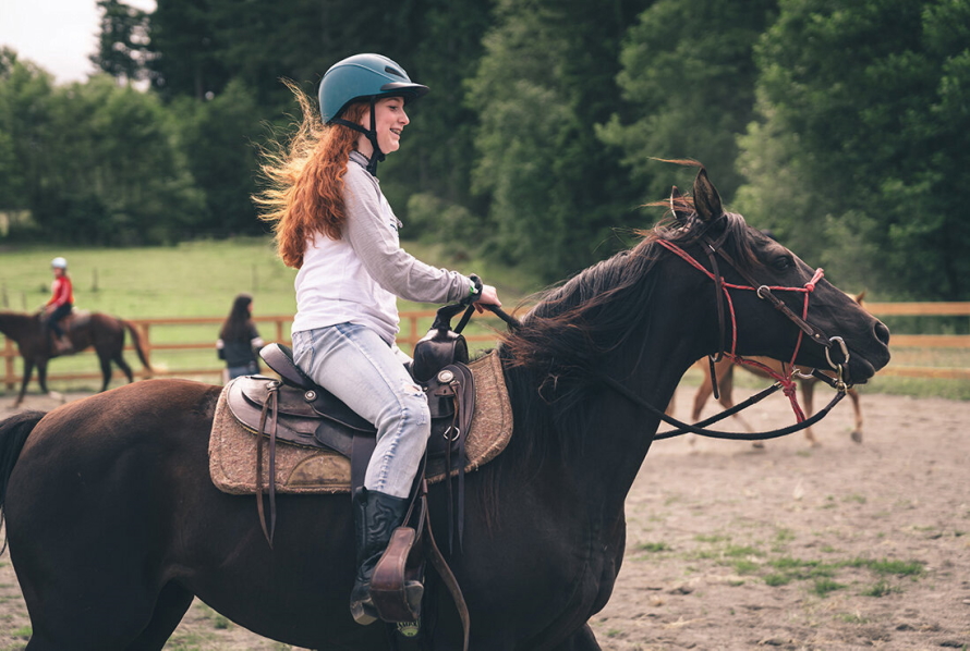 Girl ridding on a horse