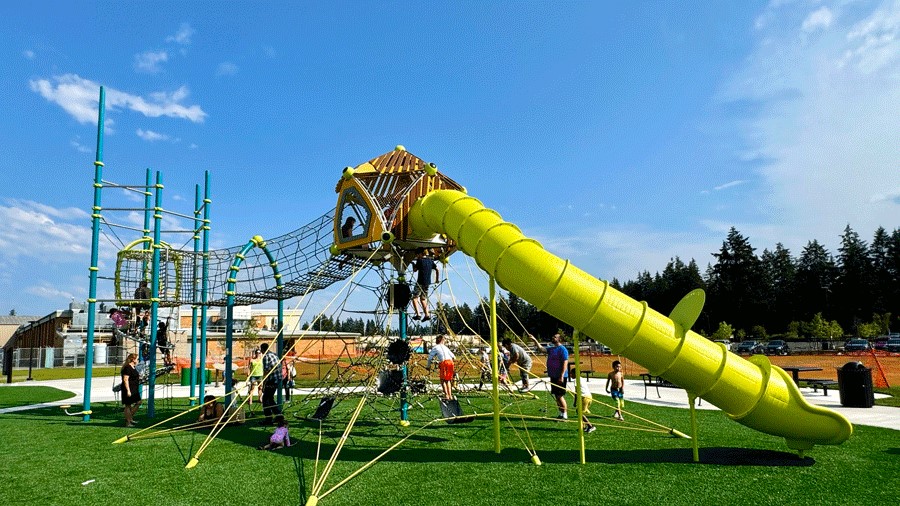 Climbing structures and a slide at Sprinker Recreation Center