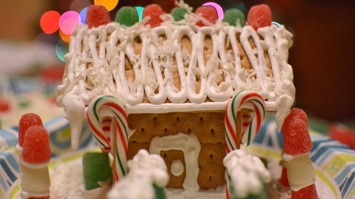 graham cracker house covered in candy