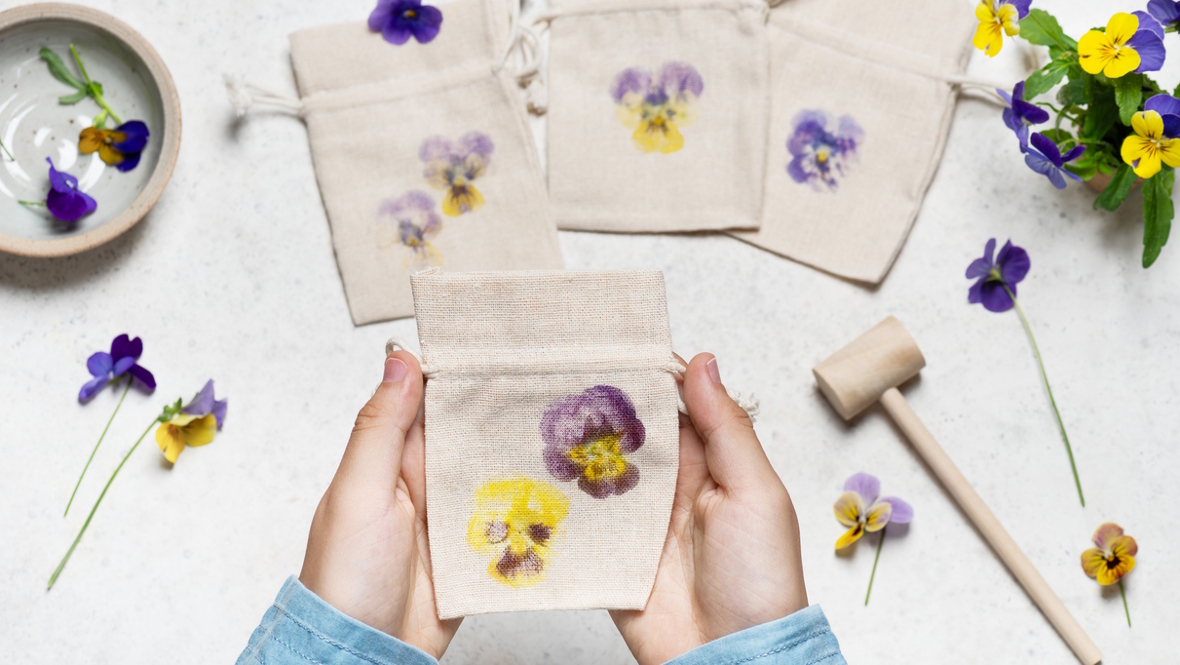 flower prints on fabric made by hitting flower with a hammer