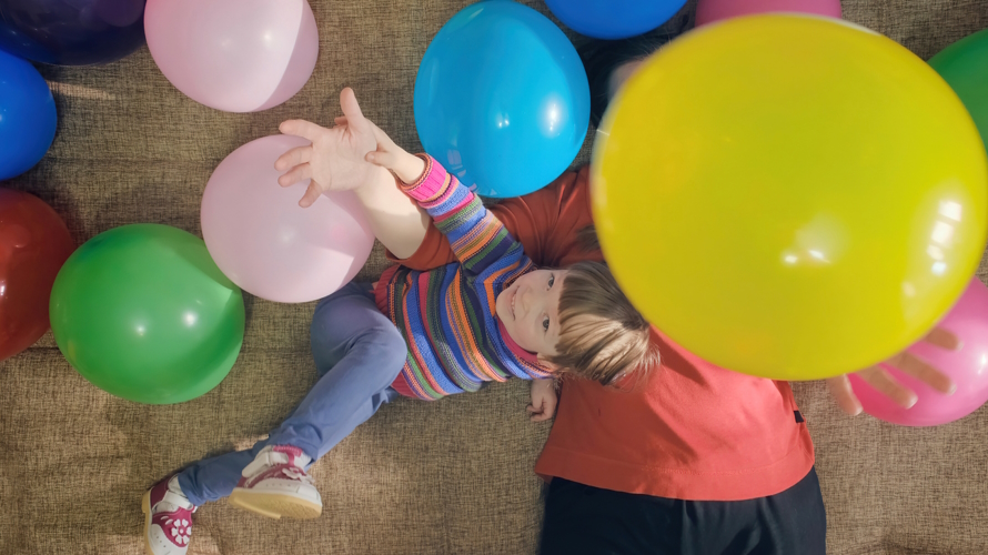 Balloons falling on a child April Fools day pranks for kids