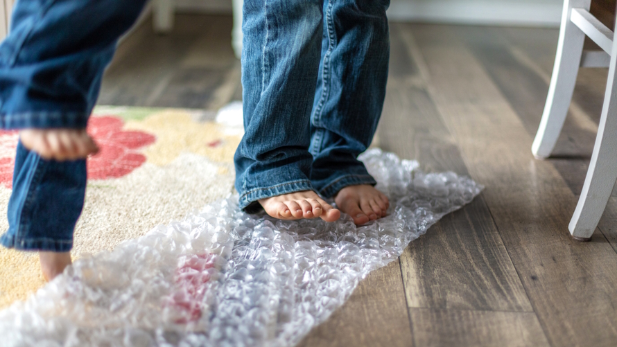 Kids feet with bubble wrap April Fool’s jokes to play on kids