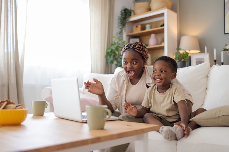 Mom and son watching the Easter Bunny on a tracking website