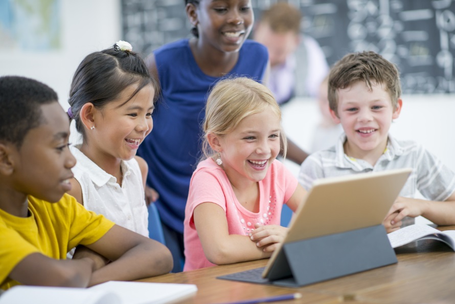 Kids watching a tablet