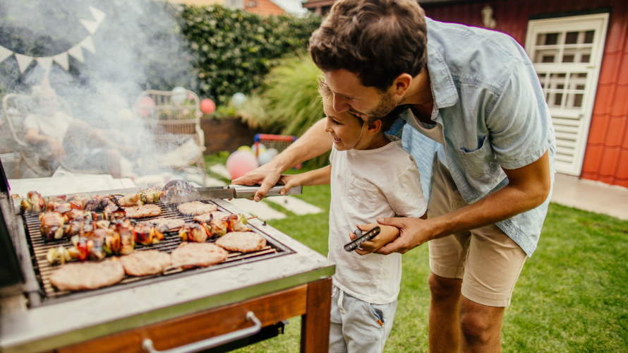 Dad-and-kid-making-barbecue-food