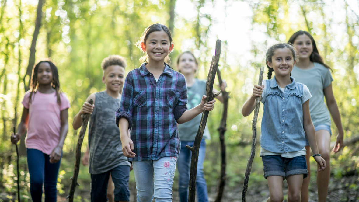 Kids walking through the woods