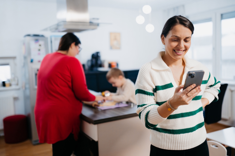mom using app to organize household