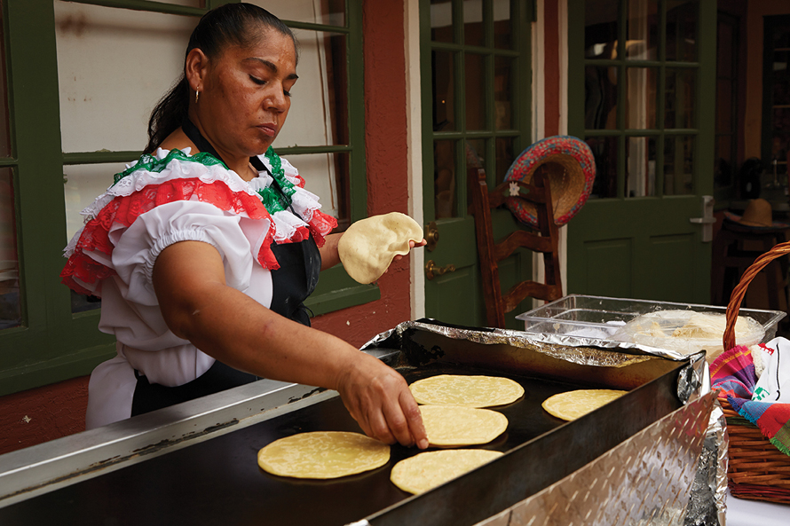 woman making tacos