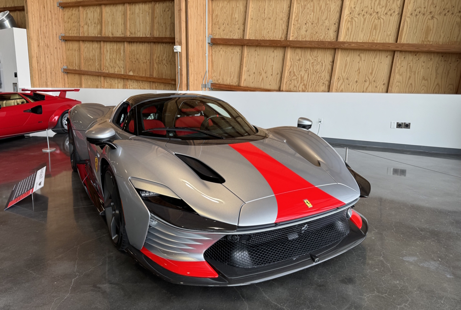 fancy gray and red sports car at ACM