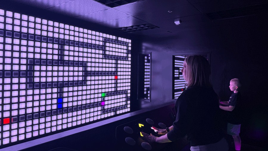 Pac-Man arcade game at C.H.E Arcade in Bellevue, a family-friendly spot
