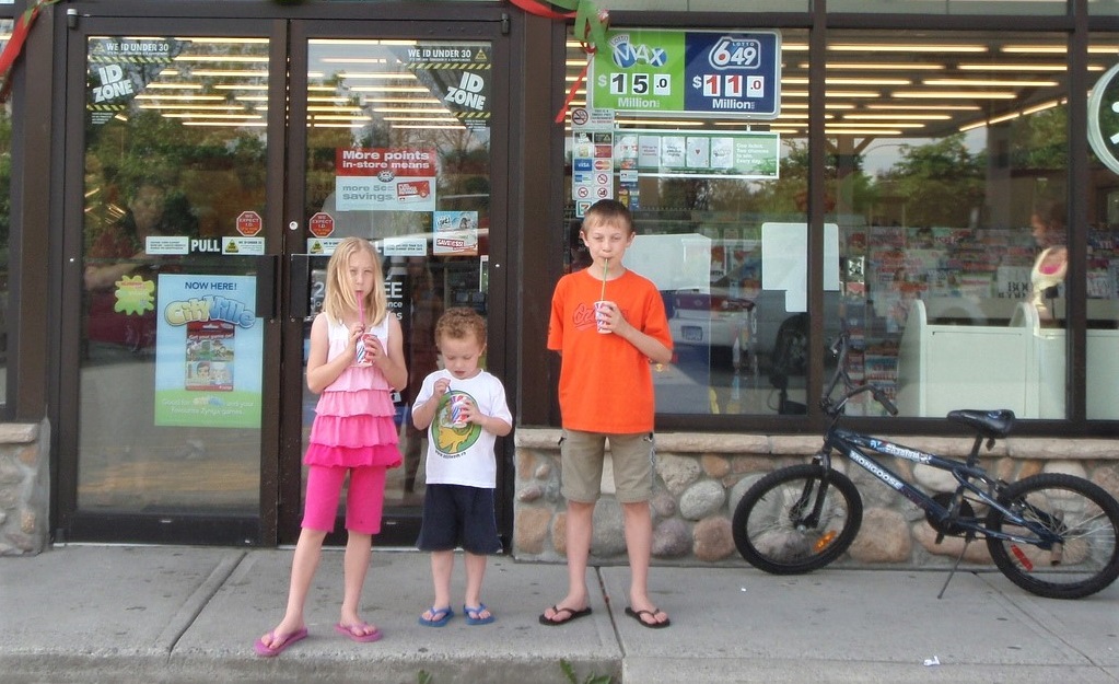 Kids drinking free Slurpees from 7-11