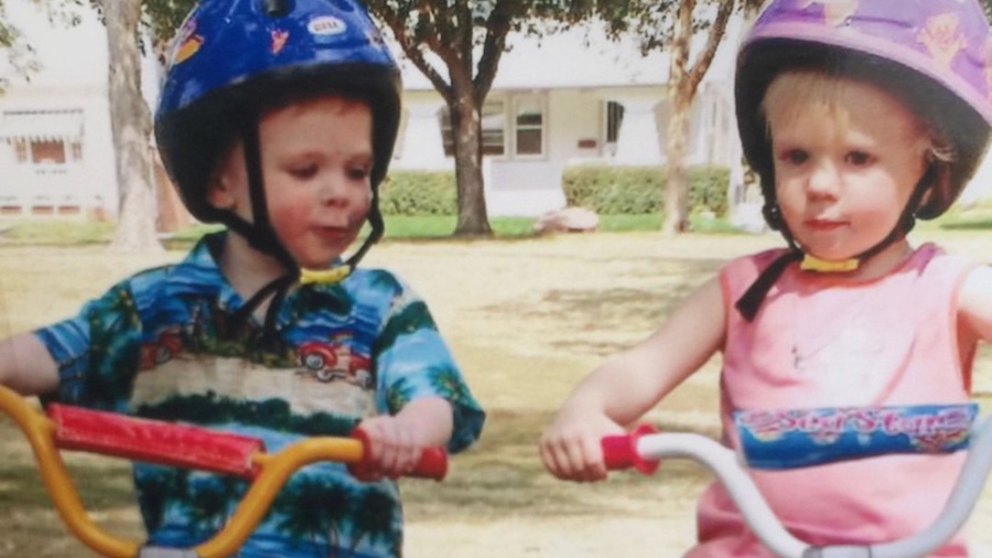 Twins Max (left) and Lucy Murrell take their bikes for a spin as children.