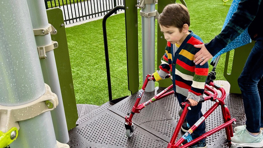 A young boy plays on the adaptive playground in Snoqualmie.
