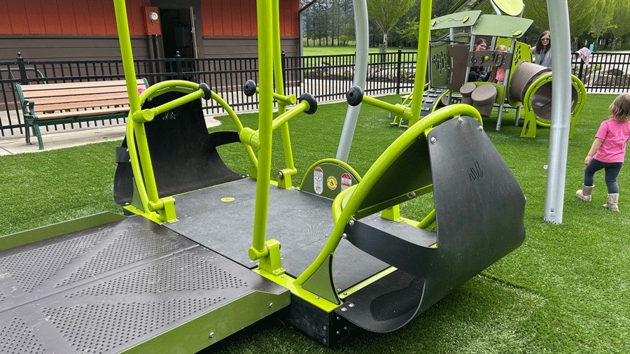 An adaptive swing at the new Snoqualmie playground accommodates mobility aids and wheelchairs.