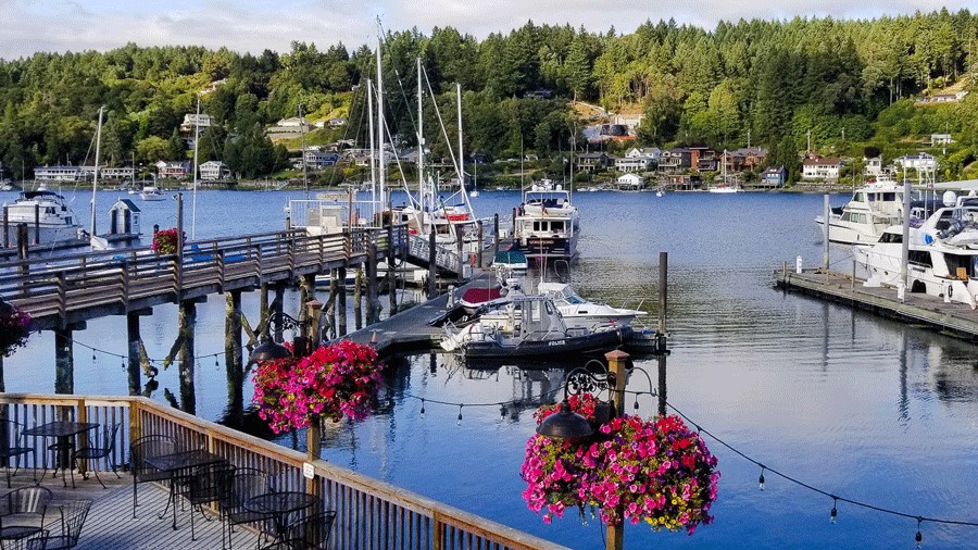 Waterfront views and boats at NetShed No.9, and outdoor waterfront restaurant near Tacoma