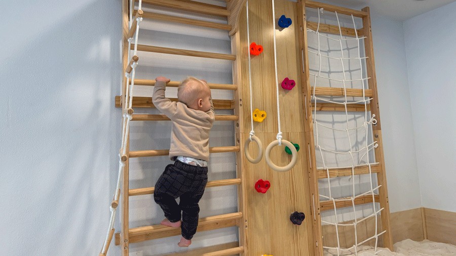 young child climbing at an indoor play place in Enumclaw