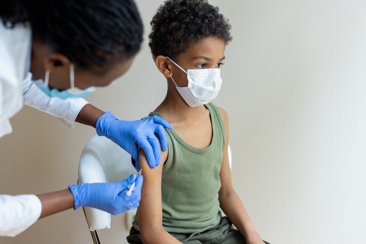 Young child getting a shot