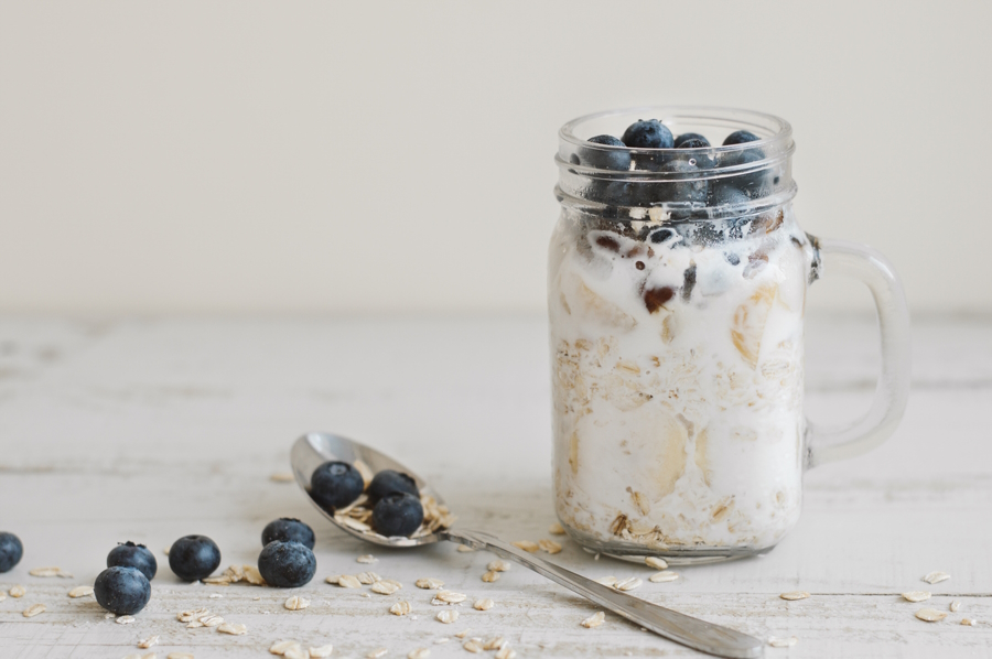 A glass jar filled with easy overnight oats, a great dairy breakfast idea