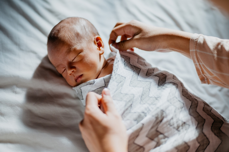 Infant in a swaddle baby essential you need