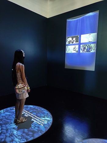 A teen visitor to the Wing Luke museum’s new Bruce Lee exhibit looks at an exhibit display