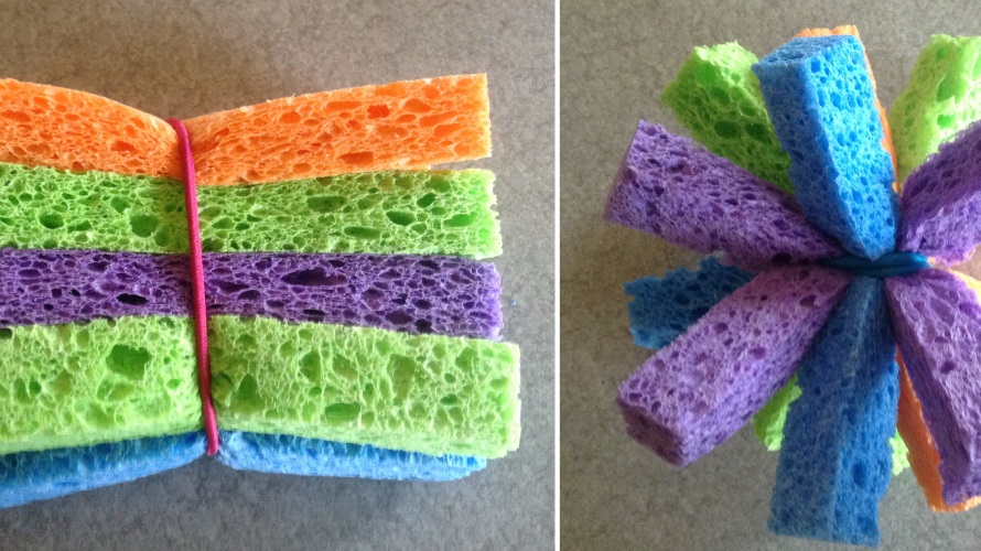 colorful sponge balls soaked in water are a good water play idea for preschoolers