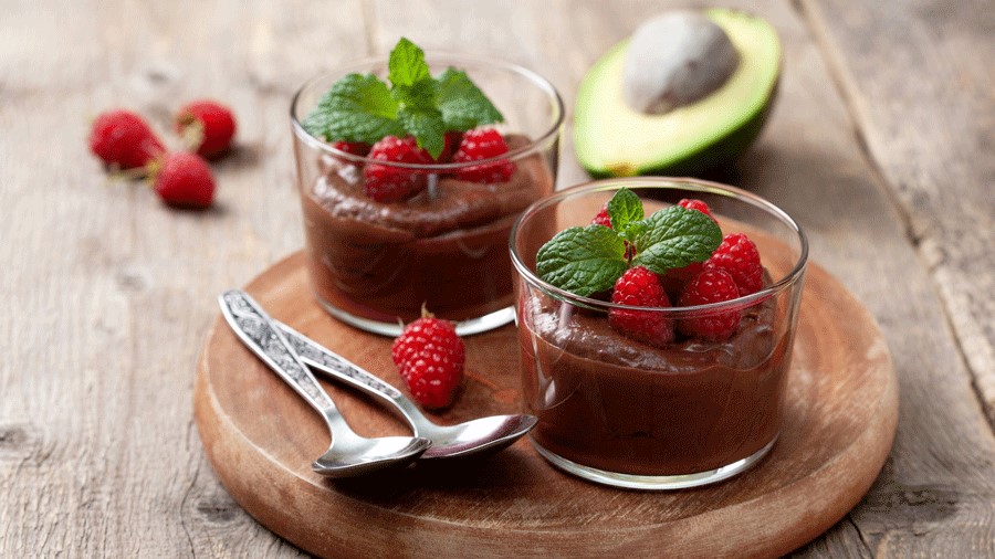 Chocolate avocado mousse with berries, a superfood dessert