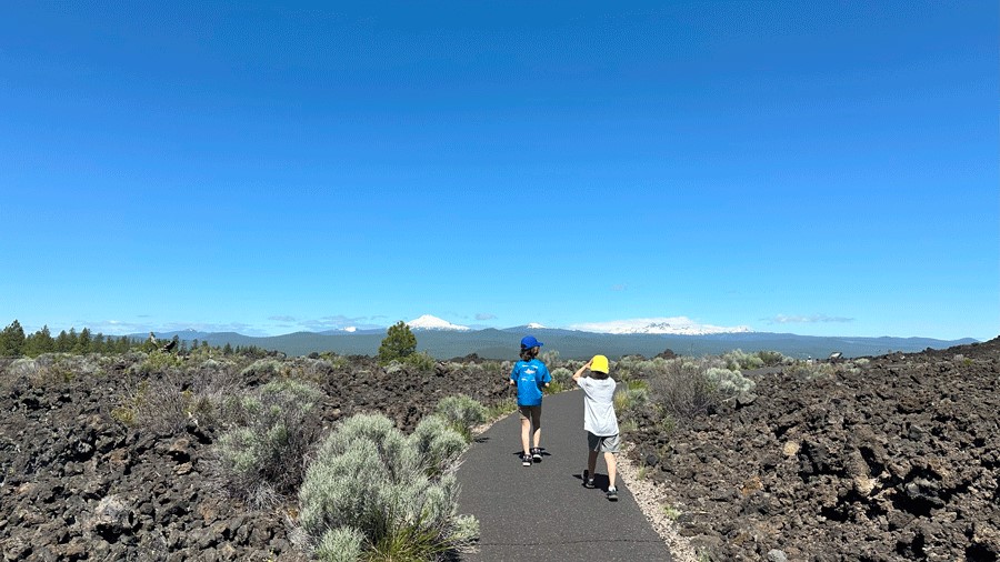 Kids hiking on the Trail of Molten Lava near Sunriver, Oregon