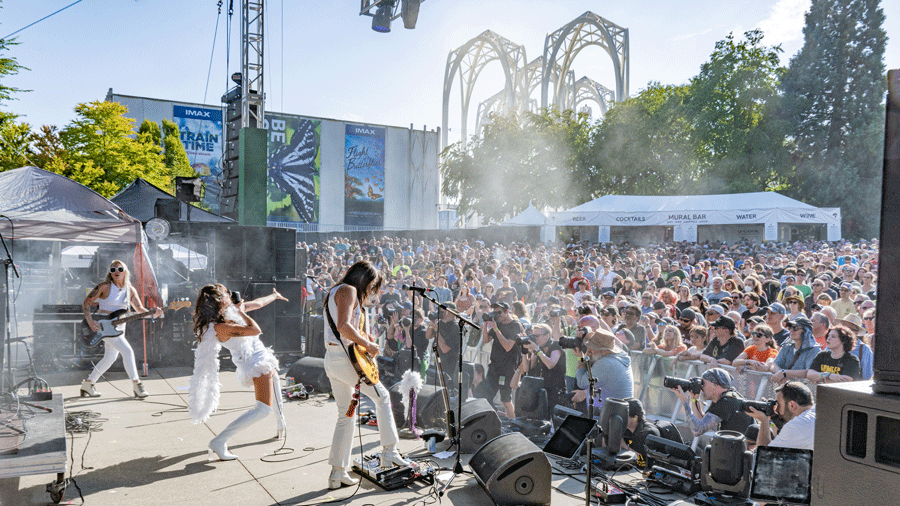 Bumbershoot 2023 band performing to a packed crowd at Seattle Center