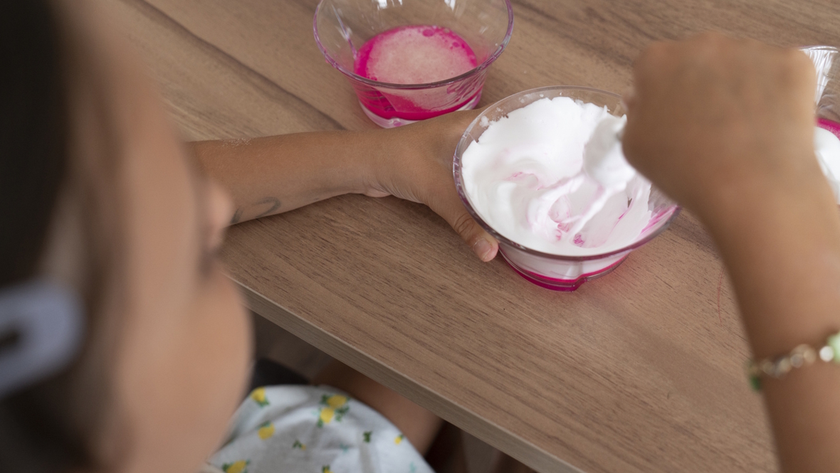mixing up baking soda for a science experiment