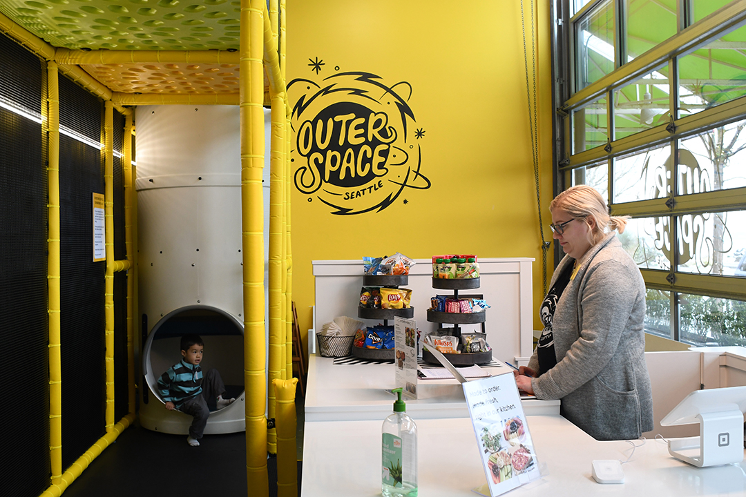 Seattle indoor playground Outer Space Seattle reopens for indoor open play with owner Caitlin Huertas at the front desk