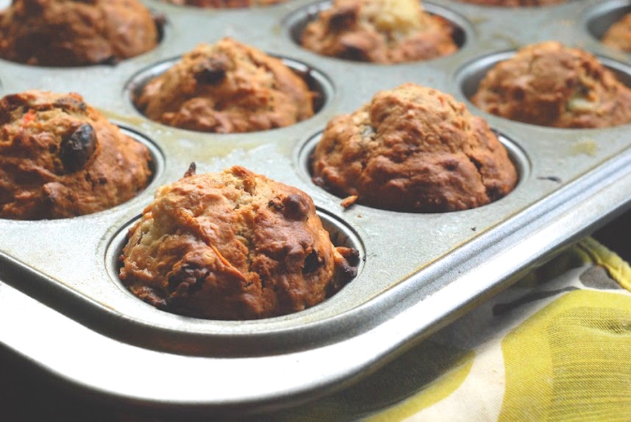 muffins in a tin sitting on a counter