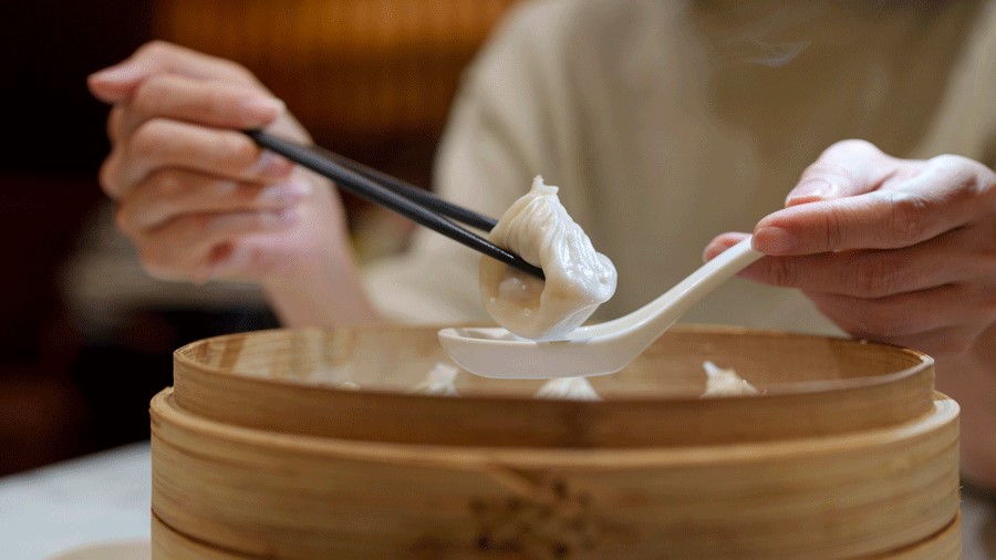 Eating soup dumplings at a Seattle dumpling restaurant