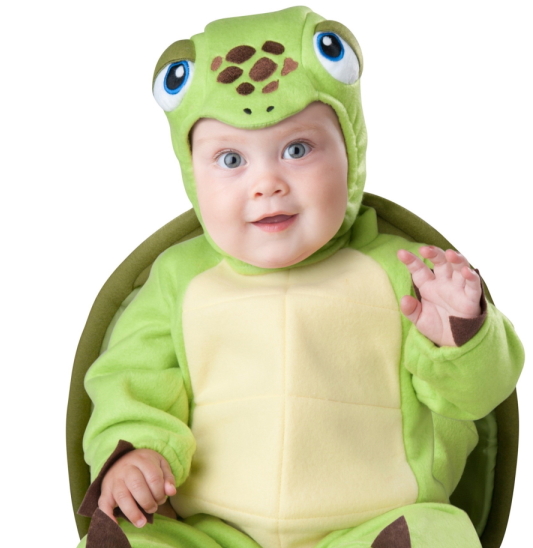 Baby wearing a turtle costume