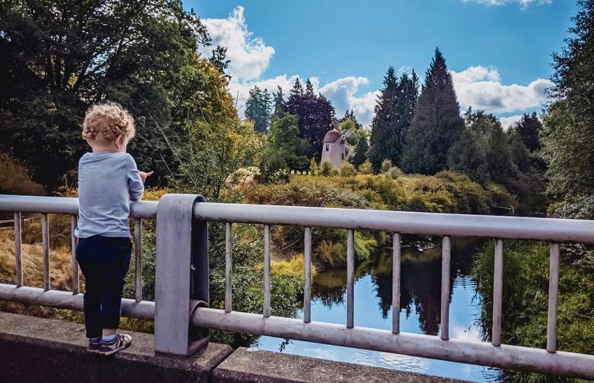 Boy on bridge at Marymoor Park he’s looking at the Sammamish River