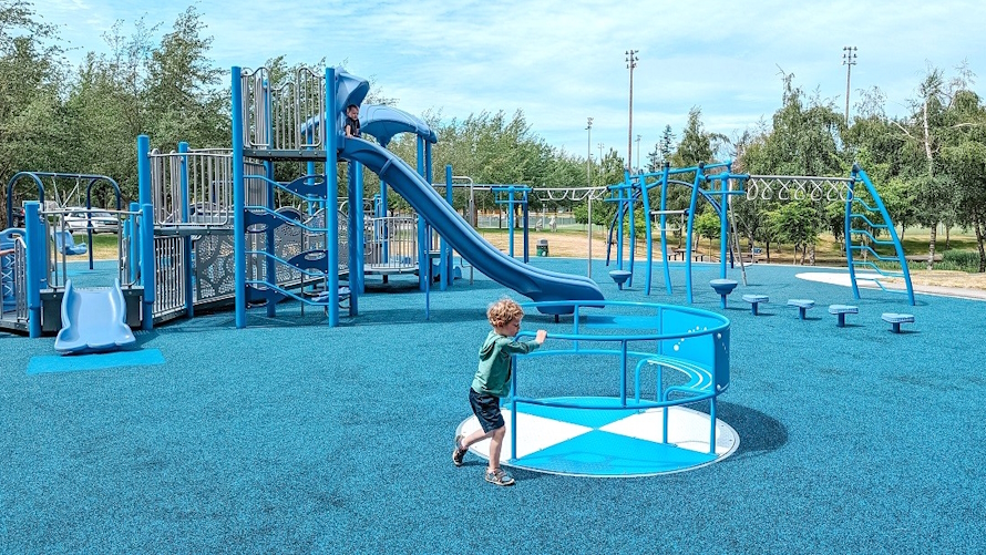 Meadowdale Playground playfield level merry go round. Photo credit Natasha Dillinger
