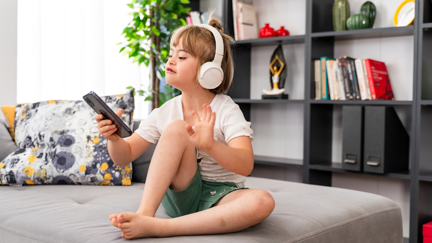 Elementary aged child wearing headphones