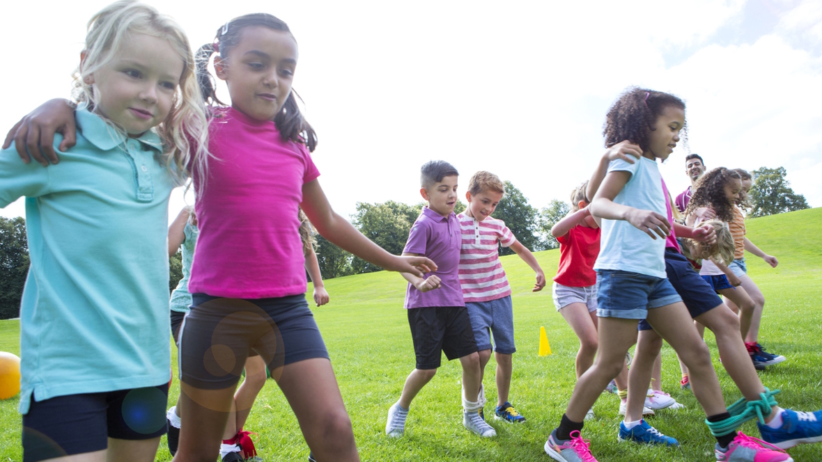 kids in a three legged race