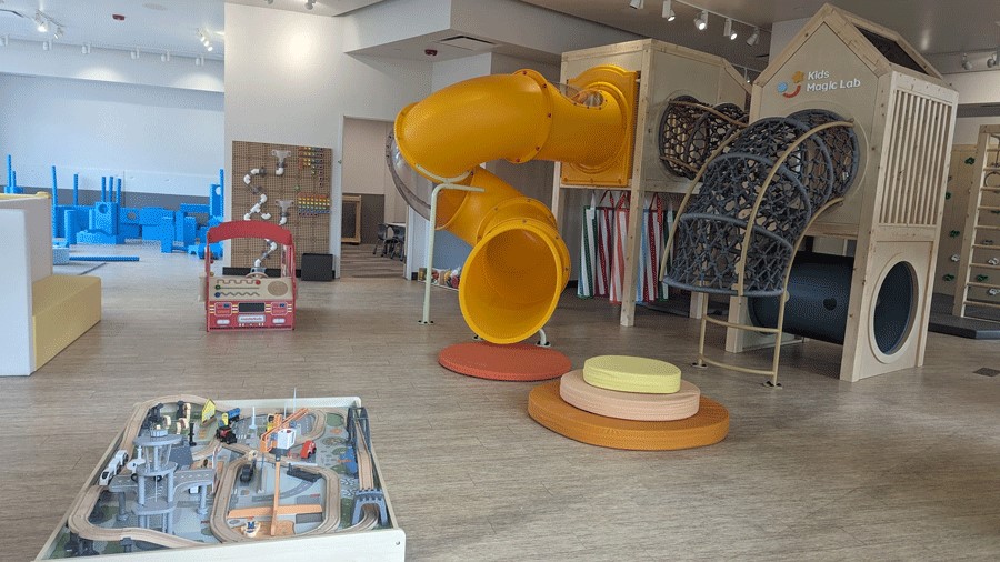 Indoor playground at Kids Magic Lab in Redmond where Seattle families can slide, climb and discover STEM activities