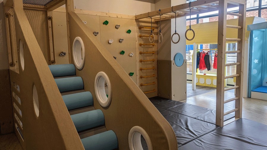 This indoor playground near Seattle has steps, monkey bars, climbing wall and gym mats for indoor play