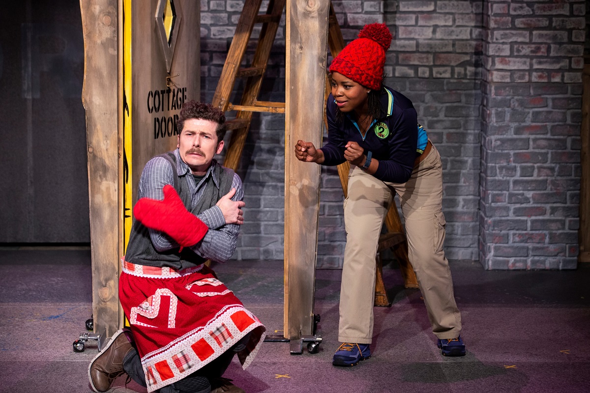 Actors Conner Nedderson and Claudine Mboligikpelani Nako portray characters in Seattle Children's Theatre 2022 production of Red Riding Hood first play back on stage after pandemic closure
